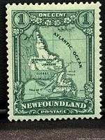 Front of the 1928 Newfoundland 1 cent postage stamp showing deep green map design and text.