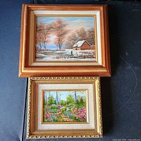 Both framed paintings stacked showing full view