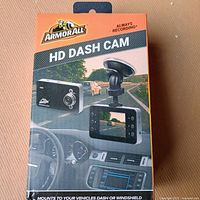 Front of Armor All HD Dash Cam retail box showing product image and branding
