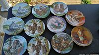 Front view of all ten decorative plates