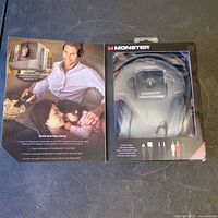 Interior view of box displaying headphones within molded packaging