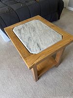 Top view showing marble inset within oak frame