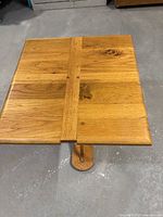Top view of square oak side table showing plank construction and finish
