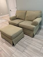 Loveseat front view with ottoman