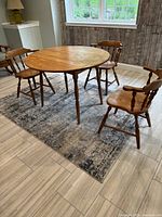 Table with three matching chairs fully assembled