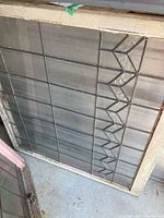 Full view of stained glass panel in frame