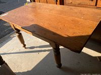 full view of rectangular wood table in natural light