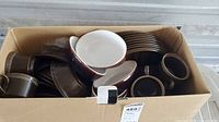 boxed dinnerware showing assorted pieces