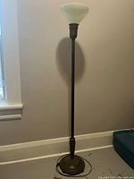 Full view of 5 ft torchiere floor lamp with milk glass shade