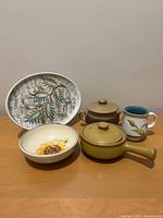 Five Denby stoneware items grouped together