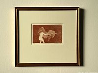 Full view of matted and framed etching