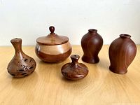 Front view all five hand-turned wooden pieces