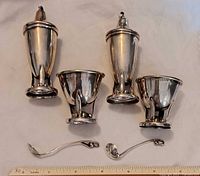 Overview of all six pieces with ruler for scale