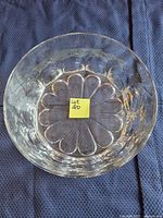 Top view of clear crystal bowl showing petal cut pattern
