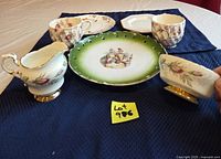 Group shot of all porcelain pieces in the lot