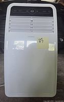 Front view of Insignia portable air conditioner showing control panel and vents