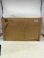 Front view of the HP monitor box showing branding and model information.