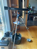Full view of telescope mounted on tripod with accessory tray