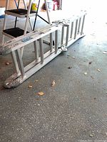 Full view of folded aluminum multipurpose ladder