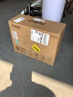 Front of sealed Zearna box with shipping label