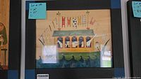 Framed watercolor painting of Noah's Ark scene with animals and flags, signed by Paige Koosed.