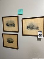 Photo showing set of 3 framed vintage prints hung on wall, with size note H 10.5" x W 11.5"