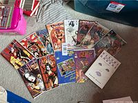 Fan layout of 13 comic books showing covers of Kabuki, Shi, Voodoo, Tomoe, Gen 13 and Kabuki trade paperback