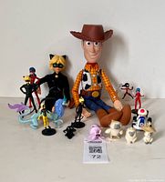 All items grouped showing Woody and assorted small figurines
