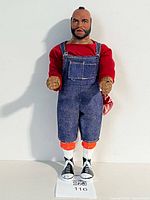 Front view of 12-inch Mr. T action figure showing outfit and accessories