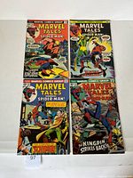 Front covers of all four comic books laid out together