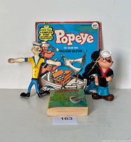 Group shot of both Popeye figures and read-along book