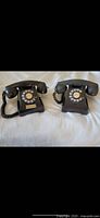 Both rotary phones side by side showing overall condition