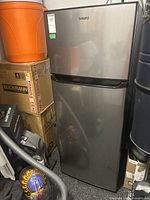 Front view of Galanz refrigerator in storage area
