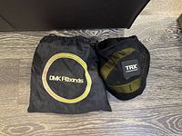 DMK Fitbands and TRX bags side by side
