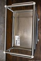 Top view of stainless steel three-tier cart