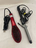 Photo of Esplee hair brush straightener and Conair curling iron side by side on light fabric background.