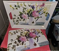 The full melamine tray and one placemat showing matching floral design.