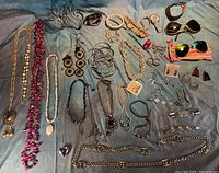 All items laid out on fabric background