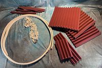 Lot overview showing foam panels, cut pieces, track rail coil, and hardware