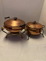 Both copper chafing dishes side by side