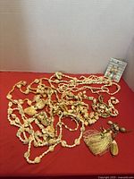 Group view of all shell necklaces, charm and earrings