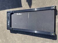 Top view of Redliro walking pad showing belt and display area