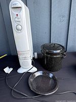 Overall view of heater, steamer pot and plate