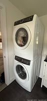 Front view of stacked Electrolux washer and dryer