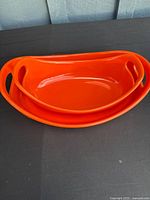 Both orange Rachael Ray bakers nested together