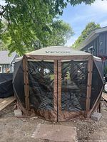 Front view of assembled VEVOR gazebo tent with mesh double doors closed