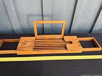 Tray fully extended showing overall design and measuring tape