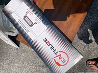 Box of Enthuze 7.5-inch Performance LED Light Bar showing brand and packaging design.