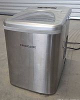 Frigidaire EFIC117-SS stainless steel countertop ice maker front view.