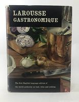 Front view of Larousse Gastronomique hardcover with dust jacket